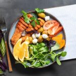 Lunch plate of salmon and vegetables showing diabetic meal prep benefits | Corporate Synergies