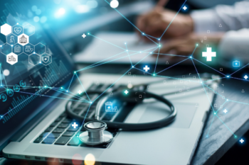 Graph and data on laptop screen with stethoscope showing how technology improves healthcare | Corporate