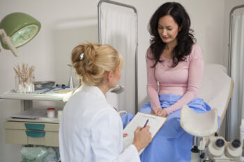 Woman talking to a gynecologist for women’s preventive health | Corporate Synergies